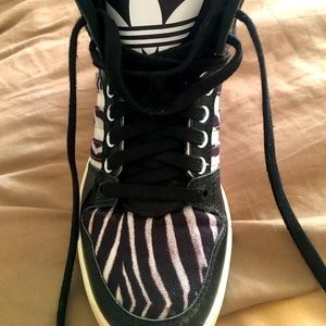 Adidas women’s high tops size 7. Worn twice
